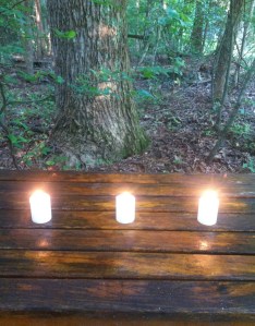 Three lights: Symbolic of the Father, the Son and the Holy Spirit.